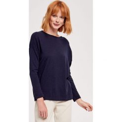 Sweter w kolorze granatowym. Niebieskie swetry damskie ZOCHA, s, bez wzorów, bez rękawów, bez kaptura. W wyprzedaży za 109,95 zł.