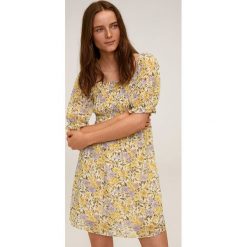 Mango - Sukienka Nicole. Białe sukienki damskie Mango, na co dzień, s, bez wzorów, z poliesteru, casualowe, z okrągłym kołnierzem, z krótkim rękawem, krótkie, mini, rozkloszowane. W wyprzedaży za 129,90 zł.