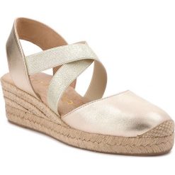 Espadryle UNISA - Cele 18 Platino Lightmt. Żółte espadryle damskie marki Unisa, ze skóry, na obcasie. W wyprzedaży za 249,00 zł.