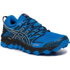 Buty ASICS - Gel-FujiTrabuco 7 G-TX GORE-TEX 1011A209 Electric Blue/Black 400. Niebieskie buty sportowe męskie Asics, ze skóry ekologicznej, bez zapięcia, do biegania, gore-tex. W wyprzedaży za 429,00 zł.
