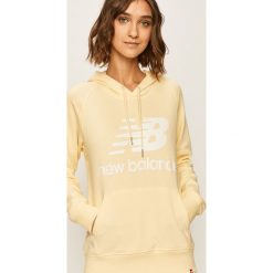New Balance - Bluza. Żółte bluzy damskie New Balance, s, z nadrukiem, z elastanu, bez rękawów, z kapturem. W wyprzedaży za 219,90 zł.