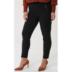 Czarne Legginsy Stirling. Czarne legginsy damskie Born2be, xl, bez wzorów, z dzianiny. Za 49,99 zł.