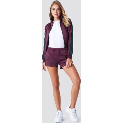 NA-KD Szorty sportowe - Purple. Fioletowe spodenki sportowe męskie NA-KD, z poliesteru. W wyprzedaży za 40,48 zł.