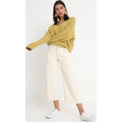 Free People TAKE ME PLACES Sweter chartreuse. Żółte bluzy damskie marki Free People, xs, bez wzorów, z bawełny, bez rękawów, bez kaptura. Za 499,00 zł.