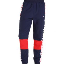 Spodnie dresowe męskie: Fila CALEB Spodnie treningowe peacoat