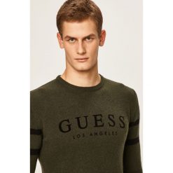 Guess Jeans - Sweter. Czarne swetry męskie s, z aplikacjami, z wełny, z okrągłym kołnierzem. W wyprzedaży za 319,90 zł.