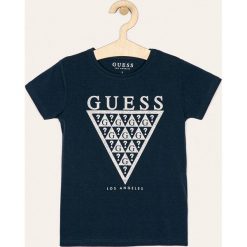 Guess Jeans - T-shirt dziecięcy 118-175 cm. Białe bluzki dziewczęce z nadrukiem, z elastanu, z okrągłym kołnierzem, krótkie. Za 89,90 zł.