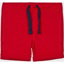 Blukids - Szorty dziecięce 68-98 cm. Czerwone spodenki chłopięce Blukids, bez wzorów, z bawełny, casualowe. W wyprzedaży za 24,90 zł.