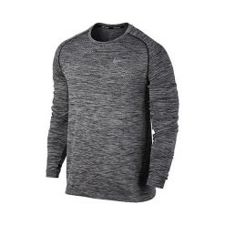 Nike M NK DF KNIT TOP LS, 10 | URUCHOMIENIE | MĘŻCZYZNA | TOP Z DŁUGIM RĘKAWEM | CZARNY / HTR | L. Czarne koszulki męskie Nike, m, bez wzorów, z dzianiny, sportowe, bez kołnierzyka, z długim rękawem, długie. W wyprzedaży za 241,73 zł.
