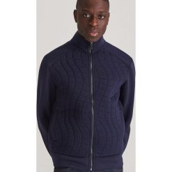 Rozpinana bluza ze stójką - Granatowy. Niebieskie bluzy męskie Reserved, s, bez wzorów, ze stójką, bez rękawów, bez kaptura. W wyprzedaży za 69,99 zł.
