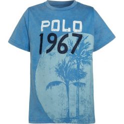 Polo Ralph Lauren Tshirt z nadrukiem florida blue. Niebieskie t-shirty chłopięce z nadrukiem marki Polo Ralph Lauren, z bawełny. Za 149,00 zł.