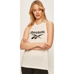 Reebok - Top. Białe topy damskie Reebok, s, z nadrukiem, z poliesteru, bez rękawów. W wyprzedaży za 69,90 zł.
