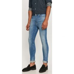 Tommy Jeans - Jeansy Simon. Niebieskie jeansy męskie Tommy Jeans, bez wzorów. Za 449,90 zł.