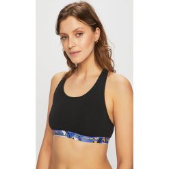 Reebok - Biustonosz. Czarne biustonosze sportowe damskie Reebok, s, bez wzorów, z elastanu. Za 79,90 zł.