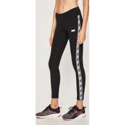 New Balance - Legginsy. Czarne spodnie damskie New Balance, s, bez wzorów, z elastanu. W wyprzedaży za 219,90 zł.
