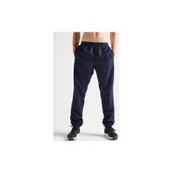 Spodnie fitness kardio FPA 120 męskie. Czarne spodnie męskie DOMYOS, s, bez wzorów, z poliesteru, klasyczne. Za 59,99 zł.