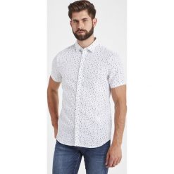 KOSZULA Armani Exchange. Koszule męskie Armani Exchange, s, bez wzorów, eleganckie, bez kołnierzyka, bez rękawów. W wyprzedaży za 319,20 zł.