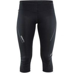 Craft Spodnie Essential Capri Black Xs. Czarne wzorzyste spodnie damskie marki Craft, xs, z materiału, na fitness i siłownię. W wyprzedaży za 159,00 zł.