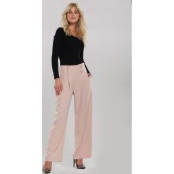 Jasnoróżowe Spodnie Euphoris. Różowe spodnie damskie Renee, s, z tkaniny, eleganckie, z podwyższonym stanem. Za 99,99 zł.