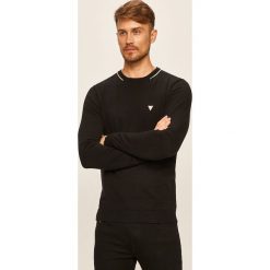 Guess Jeans - Sweter. Niebieskie swetry męskie Guess Jeans, s, z aplikacjami, z bawełny, z okrągłym kołnierzem, bez kaptura. Za 339,90 zł.