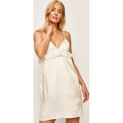 OW Intimates - Koszulka nocna Fia. Białe piżamy damskie Ow Intimates, s, bez wzorów, z poliesteru, bez rękawów. W wyprzedaży za 139,90 zł.