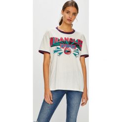 Wrangler - Top. Białe topy damskie marki Wrangler, s, z nadrukiem, z bawełny, z okrągłym kołnierzem. W wyprzedaży za 99,90 zł.