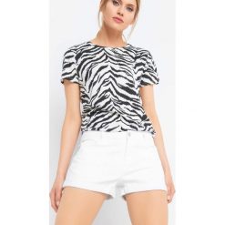 Szorty z podwijanymi nogawkami. Białe szorty damskie Orsay, s, bez wzorów, z elastanu, eleganckie. Za 49,99 zł.