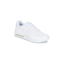 Buty Asics GEL-SAGA WG. Białe trampki i tenisówki damskie marki Asics, bez wzorów, bez zapięcia. Za 399,00 zł.