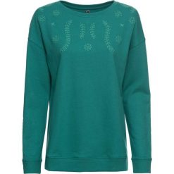 Bluza z ażurową koronką bonprix dymny szmaragdowy. Niebieskie bluzy damskie bonprix, w koronkowe wzory, z koronki, bez rękawów, bez kaptura. Za 54,99 zł.