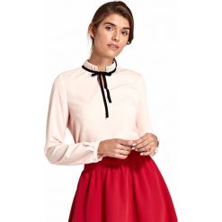 Bluzka damska elegancka ze stójką. Bluzki damskie e-margeritka.pl, xl, bez wzorów, z poliesteru, eleganckie, z krótkim rękawem, długie, bez kaptura. Za 118,99 zł.