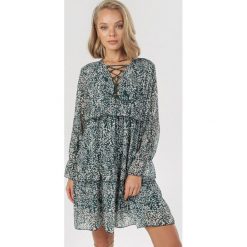 Zielona Sukienka Zaehanya. Zielone sukienki damskie Born2be, s, bez wzorów, bez kołnierzyka, bez rękawów, mini. Za 119,99 zł.
