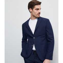 Marynarka garniturowa w sportowym stylu - Granatowy. Niebieskie marynarki garniturowe męskie Reserved, m, bez wzorów, sportowe. Za 349,99 zł.