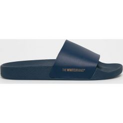 TheWhiteBrand - Klapki. Niebieskie klapki damskie TheWhiteBrand, bez wzorów, ze skóry, bez obcasa, na obcasie. W wyprzedaży za 99,90 zł.