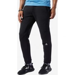 Reebok Workout Ready Spodnie dresowe Czarny. Czarne spodnie męskie Reebok, s, bez wzorów, z bawełny. Za 188,95 zł.