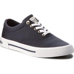 Tenisówki TOMMY HILFIGER - Heritage Textile Sneaker FW0FW02797 Midnight 403. Niebieskie półbuty damskie TOMMY HILFIGER, bez wzorów, z materiału, bez obcasa, bez zapięcia. W wyprzedaży za 209,00 zł.
