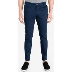 Jack & Jones Marco Spodnie Niebieski. Niebieskie spodnie męskie Jack & Jones, s, bez wzorów, z elastanu. Za 178,95 zł.