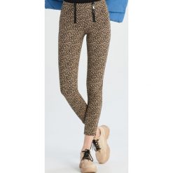 Wzorzyste tregginsy - Beżowy. Brązowe legginsy damskie Sinsay, s, bez wzorów. Za 39,99 zł.