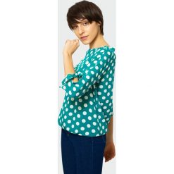 Elegancka bluzka z nadrukiem. Szare bluzki damskie Greenpoint, z nadrukiem, z wiskozy, eleganckie, bez kołnierzyka, bez rękawów. Za 49,99 zł.