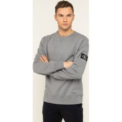 Bluza Calvin Klein Jeans Monogram J30J314035. Szare bluzy męskie Calvin Klein Jeans, s, bez wzorów, z jeansu, bez kołnierzyka, bez rękawów, bez kaptura. W wyprzedaży za 239,00 zł.