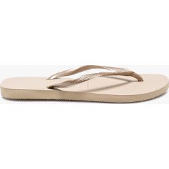 Havaianas - Japonki. Żółte klapki damskie Havaianas, bez wzorów, z materiału, bez obcasa, na obcasie. W wyprzedaży za 79,90 zł.