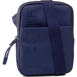 Saszetka LACOSTE - S Flat NH3136PO Blue Dephts D55. Niebieskie torby męskie skórzane Lacoste, bez wzorów, ze skóry ekologicznej, młodzieżowe. W wyprzedaży za 229,00 zł.