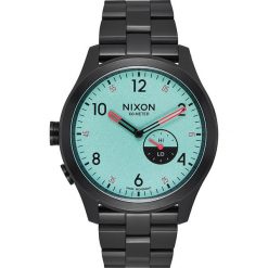Zegarek kwarcowy "Beacon" w kolorze turkusowo-czarnym. Czarne, analogowe zegarki męskie Nixon, ze stali. W wyprzedaży za 469,95 zł.
