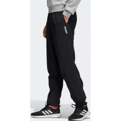 Spodnie dresowe fitness cardio męskie. Spodnie męskie Adidas, s, bez wzorów, z poliesteru, klasyczne. Za 139,99 zł.