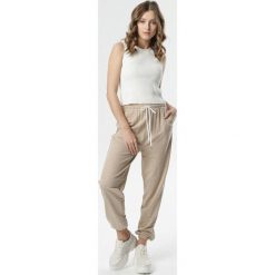 Beżowe Spodnie Make Me Wait. Brązowe spodnie damskie Born2be, s, z dresówki. Za 59,99 zł.