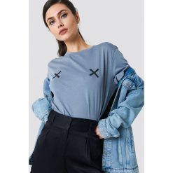 NA-KD Koszulka Double X - Blue. Niebieskie t-shirty damskie marki NA-KD, z okrągłym kołnierzem. W wyprzedaży za 29,18 zł.