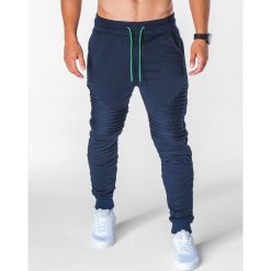 SPODNIE MĘSKIE DRESOWE P644 - GRANATOWE. Niebieskie spodnie dresowe męskie marki Ombre Clothing, s, z bawełny. Za 55,00 zł.