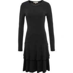MICHAEL Michael Kors SOLID Sukienka z dżerseju black. Czarne sukienki damskie MICHAEL Michael Kors, s, bez wzorów, z elastanu, bez kołnierzyka, bez rękawów. Za 1049,00 zł.