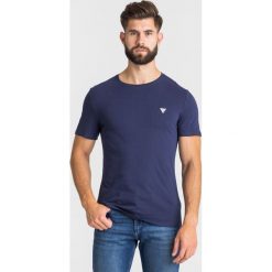 T-SHIRT GUESS. Niebieskie t-shirty męskie Guess, s, z nadrukiem, z bawełny, z okrągłym kołnierzem. Za 139,00 zł.