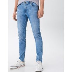 Jeansy slim fit z bawełny organicznej - Niebieski. Niebieskie jeansy męskie House, m, bez wzorów. Za 139,99 zł.