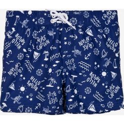 Blukids - Kąpielówki dziecięce 104-128 cm. Niebieskie kąpielówki chłopięce Blukids, bez wzorów, z poliesteru. W wyprzedaży za 27,90 zł.